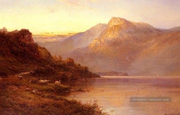 Coucher de soleil sur le Loch paysage Alfred de Breanski Snr Peinture à l'huile